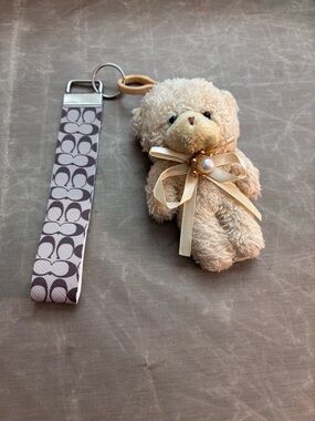 Coach Signature Pink Beige Bear Keychain Wristlet